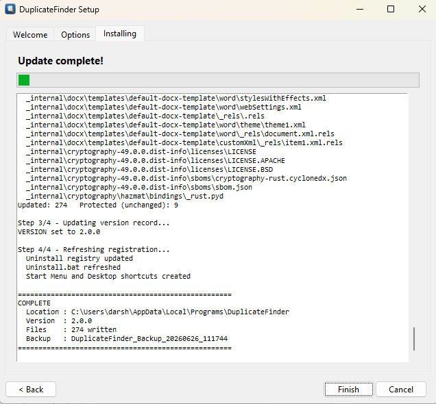 Setup Installing tab showing Update complete with file log and Finish button